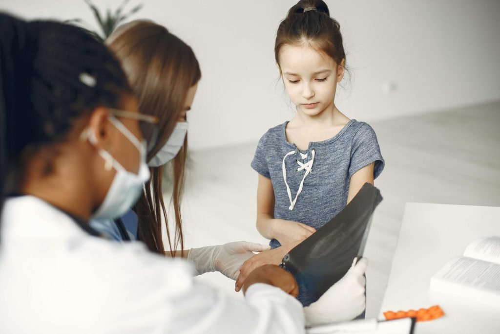 Photo by Gustavo Fring A Young Girl Having a Checkup at the Clinic
